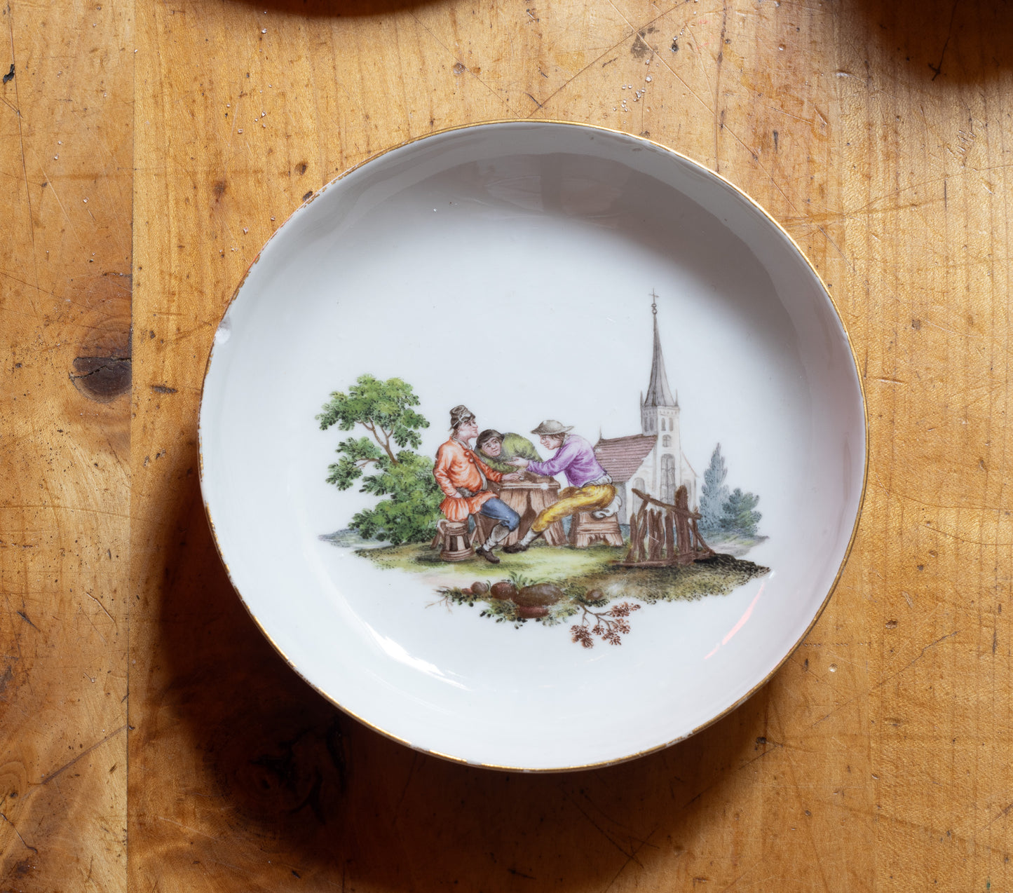 Meissen Kop en Schotel Trio met ‘Teniers’ Plattelandstaferelen – ca. 1755